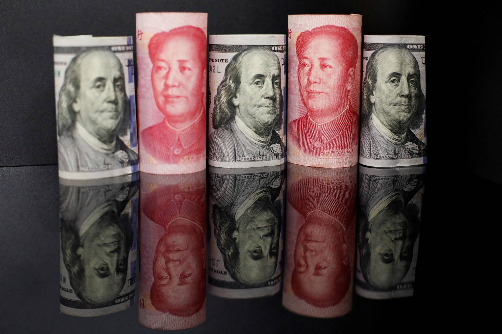 Chinese Companies Hang Onto Dollars And Hedge To Prepare For Volatile 