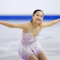 Mao Shimada performs during the junior figure skating world championships in Calgary on Friday. | KYODO