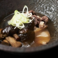 At Dewaya, bear meat is simmered in a nabe (hotpot) with a mix of foraged fungi to imbue extra umami. | KOUTAROU WASHIZAKI

