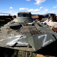 An armored vehicle left behind by the Russian military on Klepach\'s farm | REUTERS