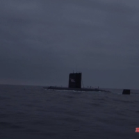A North Korean submarine is seen before firing off two \"strategic cruise missiles\" at an undisclosed location on Sunday. | KCNA / VIA REUTERS    