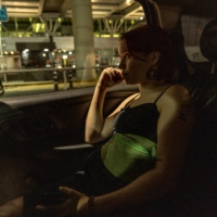 Konovalova arrives at the airport in Buenos Aires to pick up her husband on Feb. 24. | SARAH PABST / THE NEW YORK TIMES