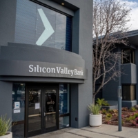 Customers in line outside Silicon Valley Bank headquarters in Santa Clara, California, on Monday | BLOOMBERG