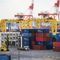 Containers at a shipping terminal in Yokohama | BLOOMBERG
