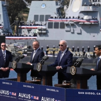 Australian Prime Minister Anthony Albanese, U.S. President Joe Biden and British leader Rishi Sunak 
speak to reporters about the AUKUS summit at a naval base in San Diego, California, on Monday. 

 | AFP-JIJI