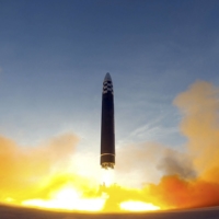A North Korean Hwasong-17 intercontinental ballistic missile is launched from Pyongyang International Airport in this image released Friday.  | KCNA / KNS / VIA AFP-JIJI