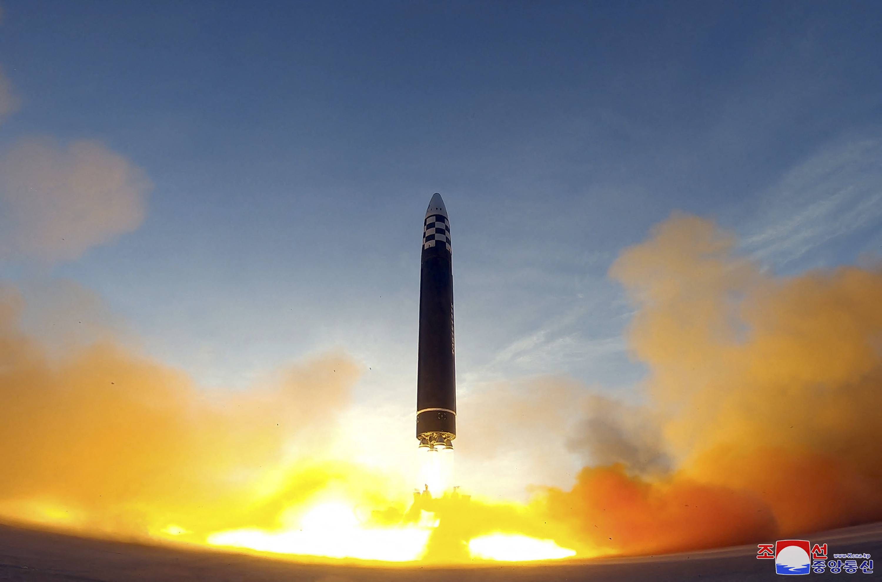 A North Korean Hwasong-17 intercontinental ballistic missile is launched from Pyongyang International Airport in this image released Friday. | KCNA / KNS / VIA AFP-JIJI