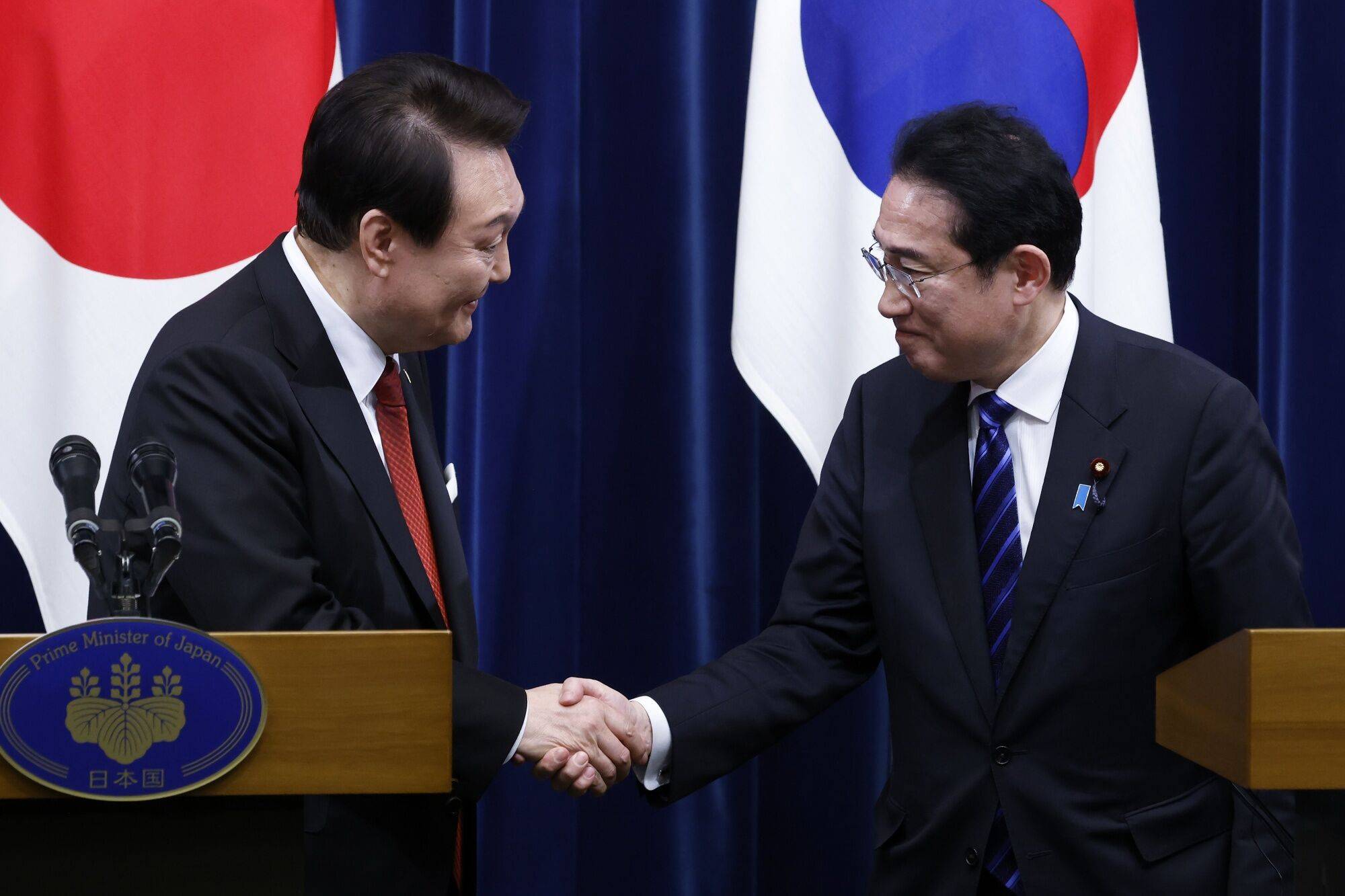 South Korean President Yoon Suk-yeol and Prime Minister Fumio Kishida following a joint news conference at the Prime Minister's Office in Tokyo on Thursday | BLOOMBERG