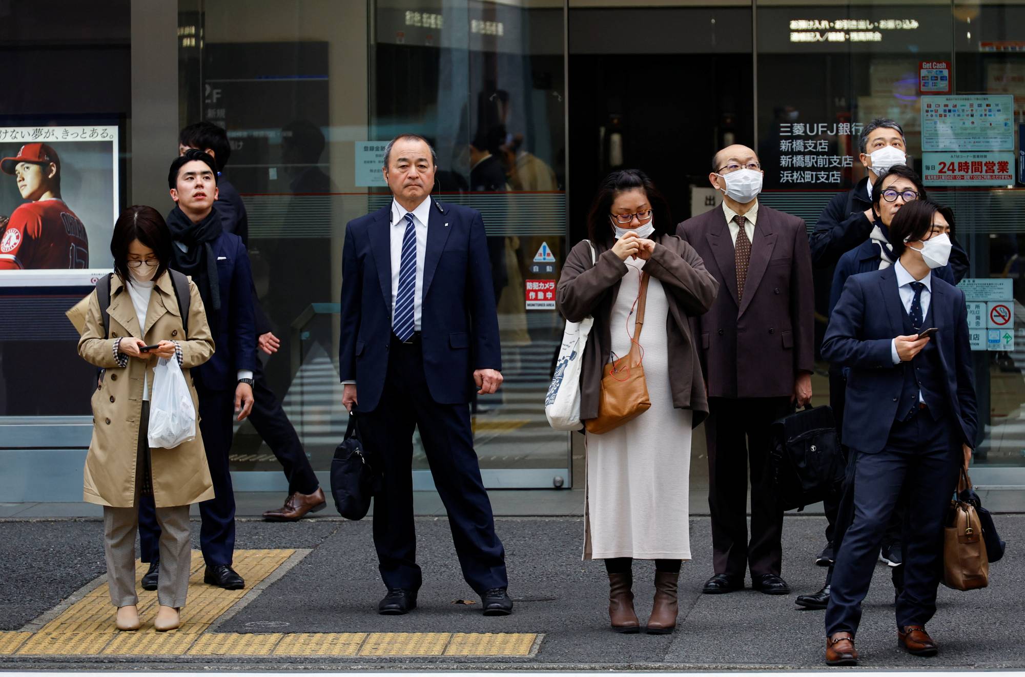 Commuters in Tokyo earlier this month. Japan’s top labor unions won their biggest wage hikes in decades amid historic levels of inflation, results that could have implications for the Bank of Japan’s policy path. | REUTERS