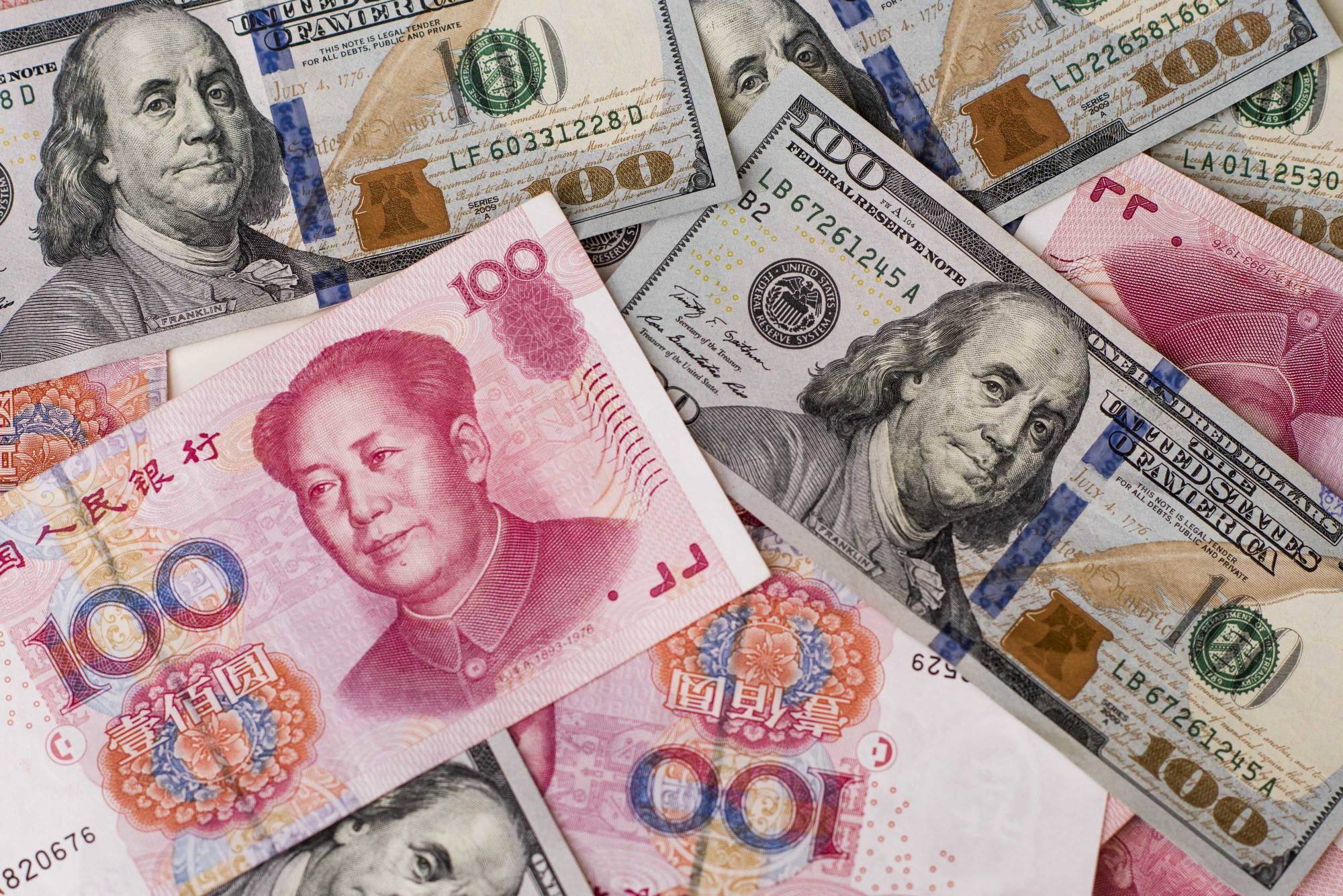 The presumption has been that geopolitics will shape the global financial order in China’s favor. But technology may interfere with the yuan taking on the dollar for international payments. | BLOOMBERG 