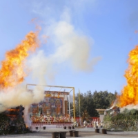 Spectacular orange pillars of fire burst from two <i>gomadan</i> pyres at the Agon Shu Fire Rites Festival in Kyoto on Feb. 13. Some 20 million <i>gomagi</i> (prayer sticks) were burned this year.