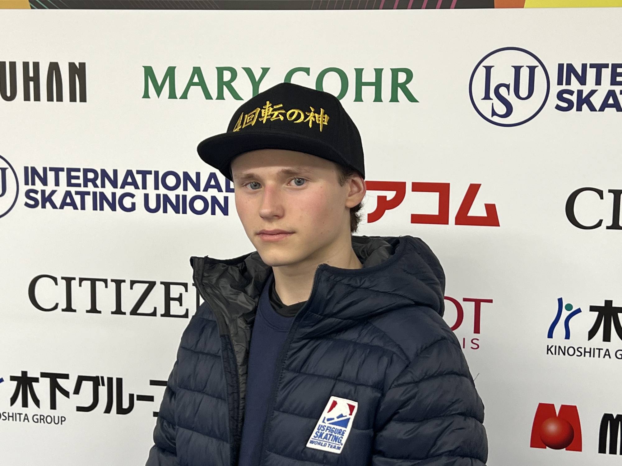 Malinin sports a cap with his 