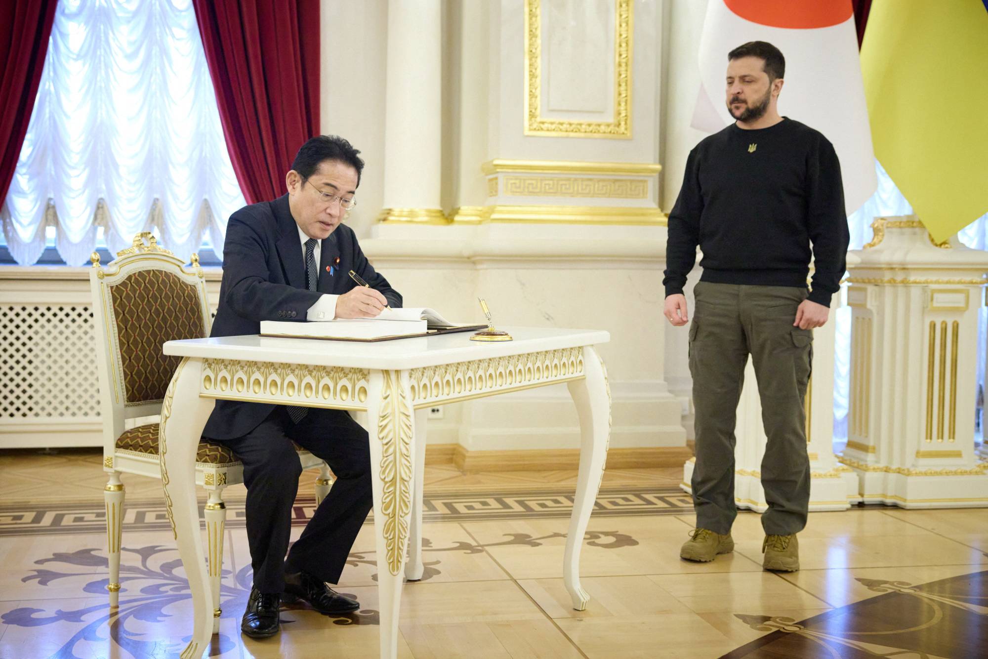 Prime Minister Fumio Kishida and Ukrainian leader Volodymyr Zelenskyy issued a joint statement upgrading bilateral ties to a “special global partnership” during the Japanese leader's visit to the war-torn country on Tuesday. | UKRAINIAN PRESIDENTIAL PRESS SERVICE / VIA REUTERS  