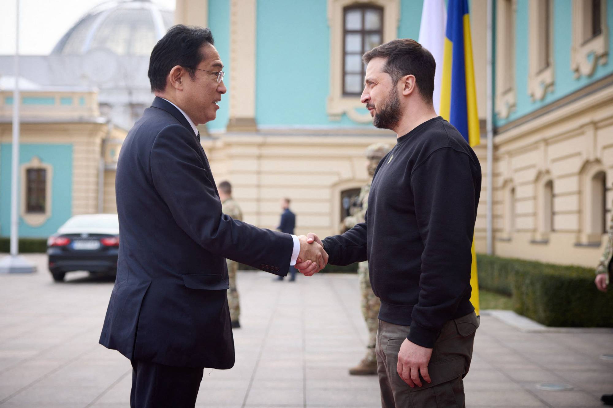 Prime Minister Fumio Kishida is welcomed by Ukrainian President Volodymyr Zelenskyy for a meeting at Mariinsky Palace in Kyiv on Tuesday. | UKRAINIAN PRESIDENTIAL PRESS SERVICE / VIA AFP-JIJI 