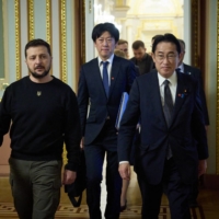 Ukrainian President Volodymyr Zelenskyy and Prime Minister Fumio Kishida arrive for a meeting at Mariinsky Palace in Kyiv on Tuesday. | UKRAINIAN PRESIDENTIAL PRESS SERVICE / VIA AFP-JIJI 