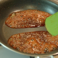When you can draw your spatula through your pan and leave a clean line through the teriyaki glaze, you\'re nearly done. | ELIZABETH ANDOH