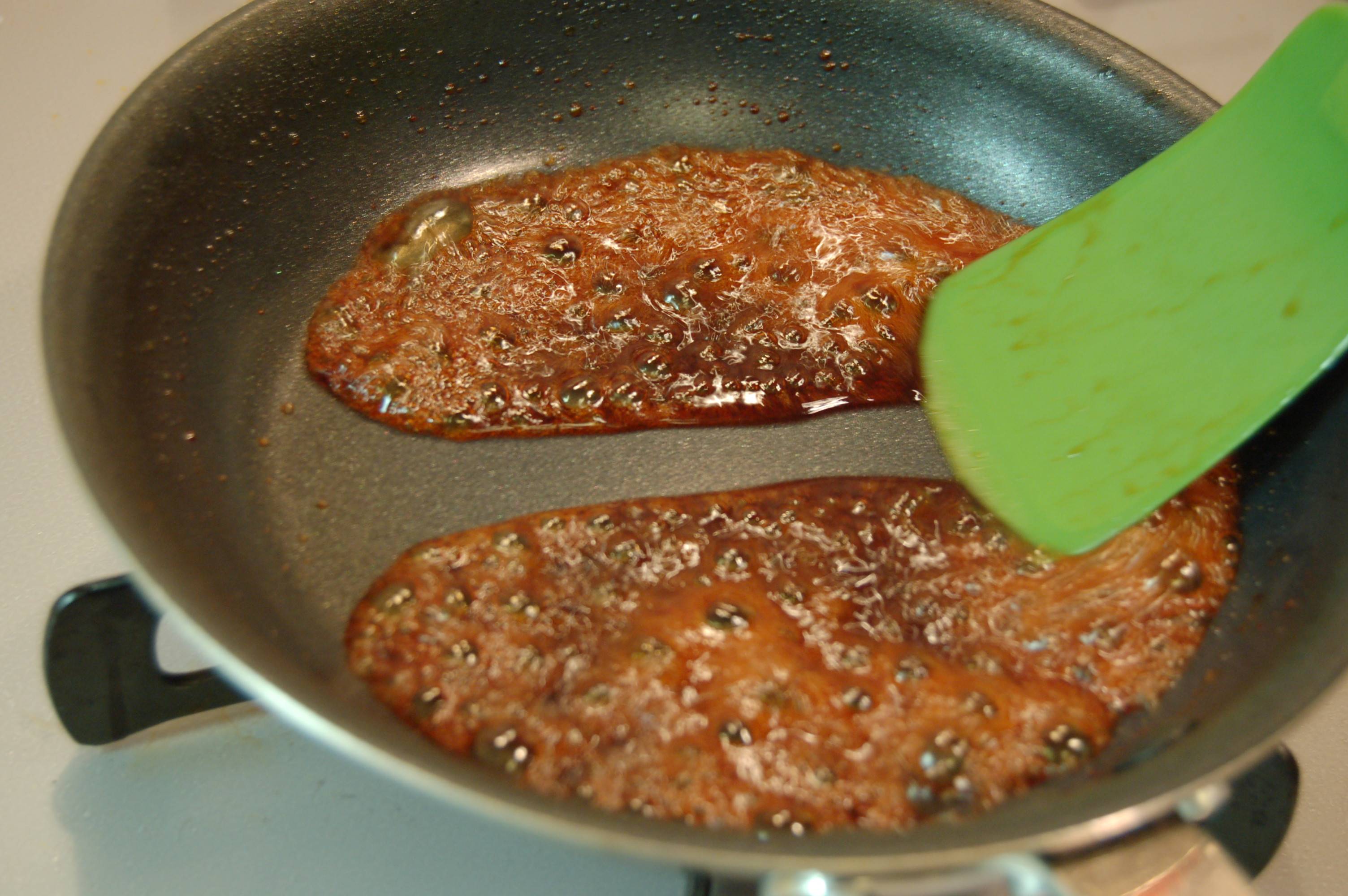 When you can draw your spatula through your pan and leave a clean line through the teriyaki glaze, you're nearly done. | ELIZABETH ANDOH