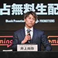 Boxer Naoya Inoue takes part in a press conference in Tokyo on March 6 to announce his intention to fight for two world titles in his super-bantamweight boxing debut in a bout against Stephen Fulton of the U.S. | AFP-JIJI