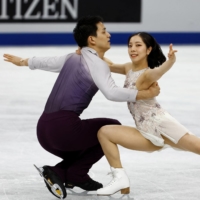 Miura and Kihara perform during the pairs free skating at Saitama Super Arena on Thursday. | REUTERS