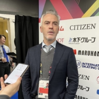 Figure skating coach Bruno Marcotte speaks to reporters after Thursday\'s pairs free skate. | DAN ORLOWITZ
