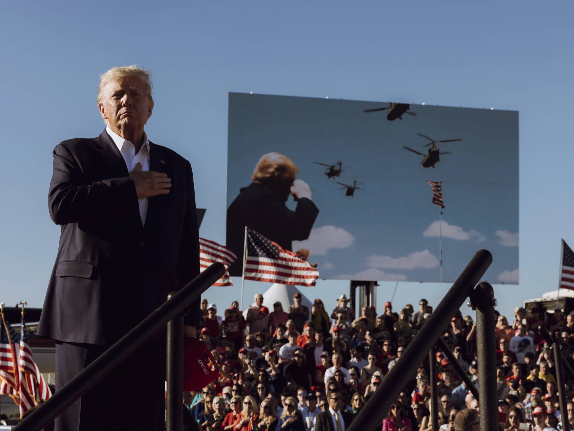 Former U.S. President Donald Trump stands during a campaign rally at Waco Regional Airport, in Waco, Texas, on Saturday. | CHRISTOPHER LEE / THE NEW YORK TIMES