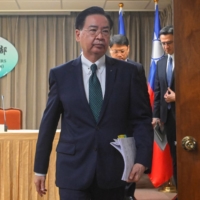Taiwanese Foreign Minister Joseph Wu leaves after a news conference in Taipei on Saturday to confirm that Honduras has broken off diplomatic relations with Taipei.  | AFP-JIJI