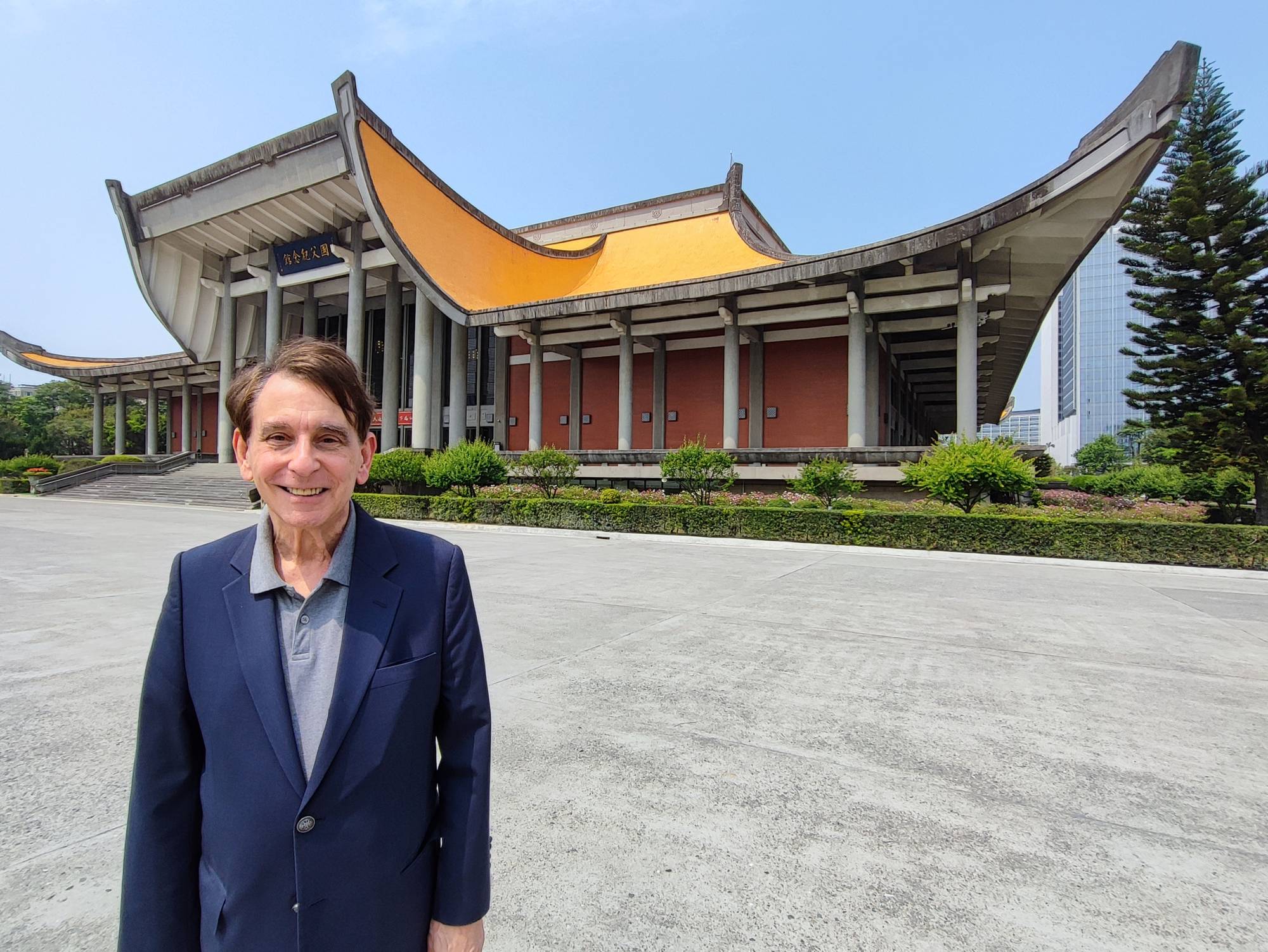 William Stanton, former director of the American Institute in Taiwan (AIT), the de facto U.S. embassy in Taiwan, stands in front of the Sun Yat-Sen Memorial Hall in Taipei during an interview earlier this month.  | GABRIEL DOMINGUEZ