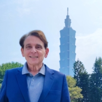 Stanton stands in front of the Taipei 101 tower in the Taiwanese capital after a recent interview. | GABRIEL DOMINGUEZ