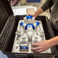 Nao the posture-performing robot during a focus group in Carpi, Italy, on March 6. The Western world’s oldest population is facing a crisis of caregivers. Some are looking for a little helping, plastic, hand. | ALESSANDRO GRASSANI / THE NEW YORK TIMES