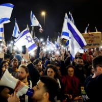 Crowds attend a demonstration in Jerusalem on Monday | REUTERS
