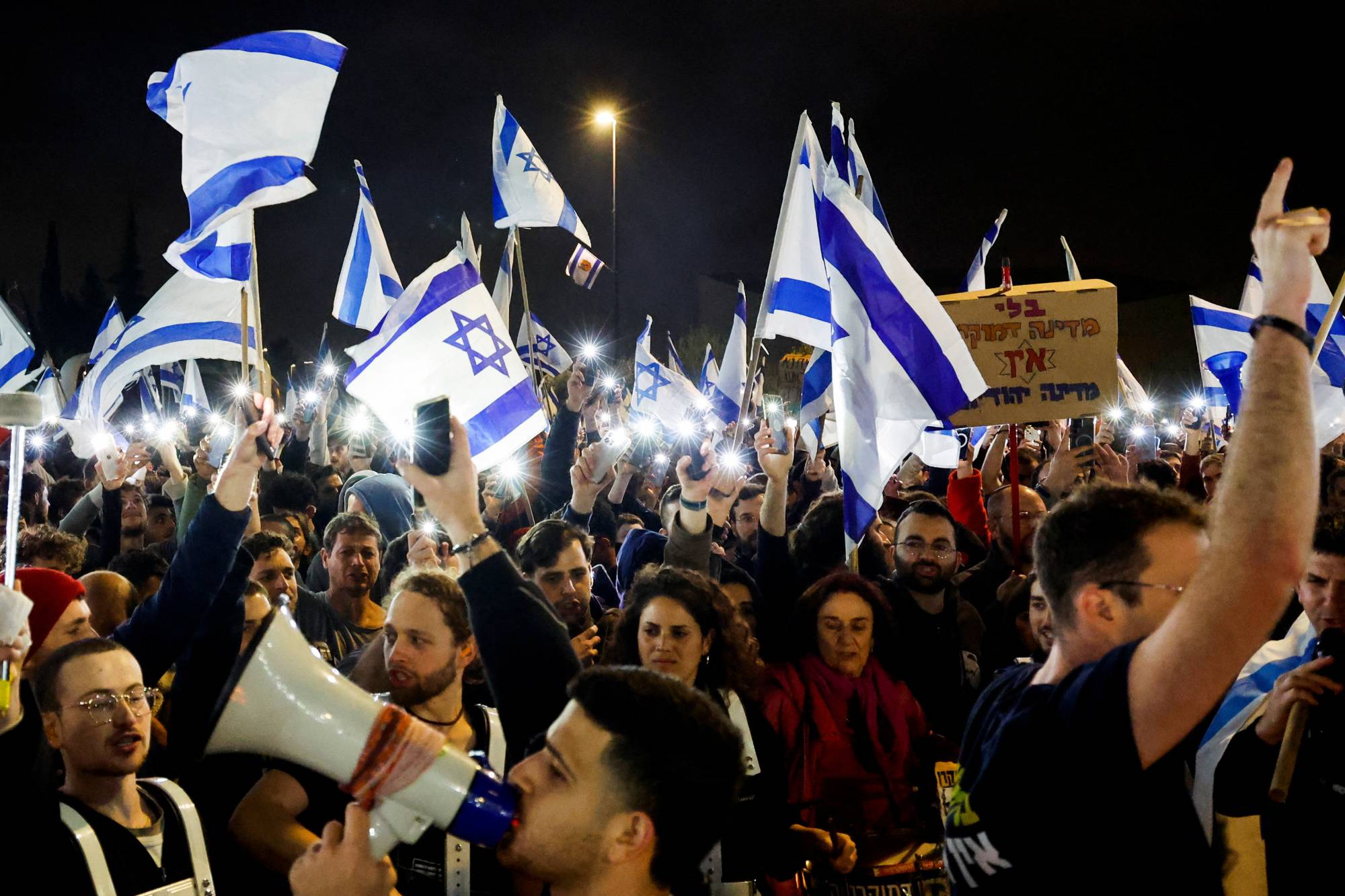 Crowds attend a demonstration in Jerusalem on Monday | REUTERS