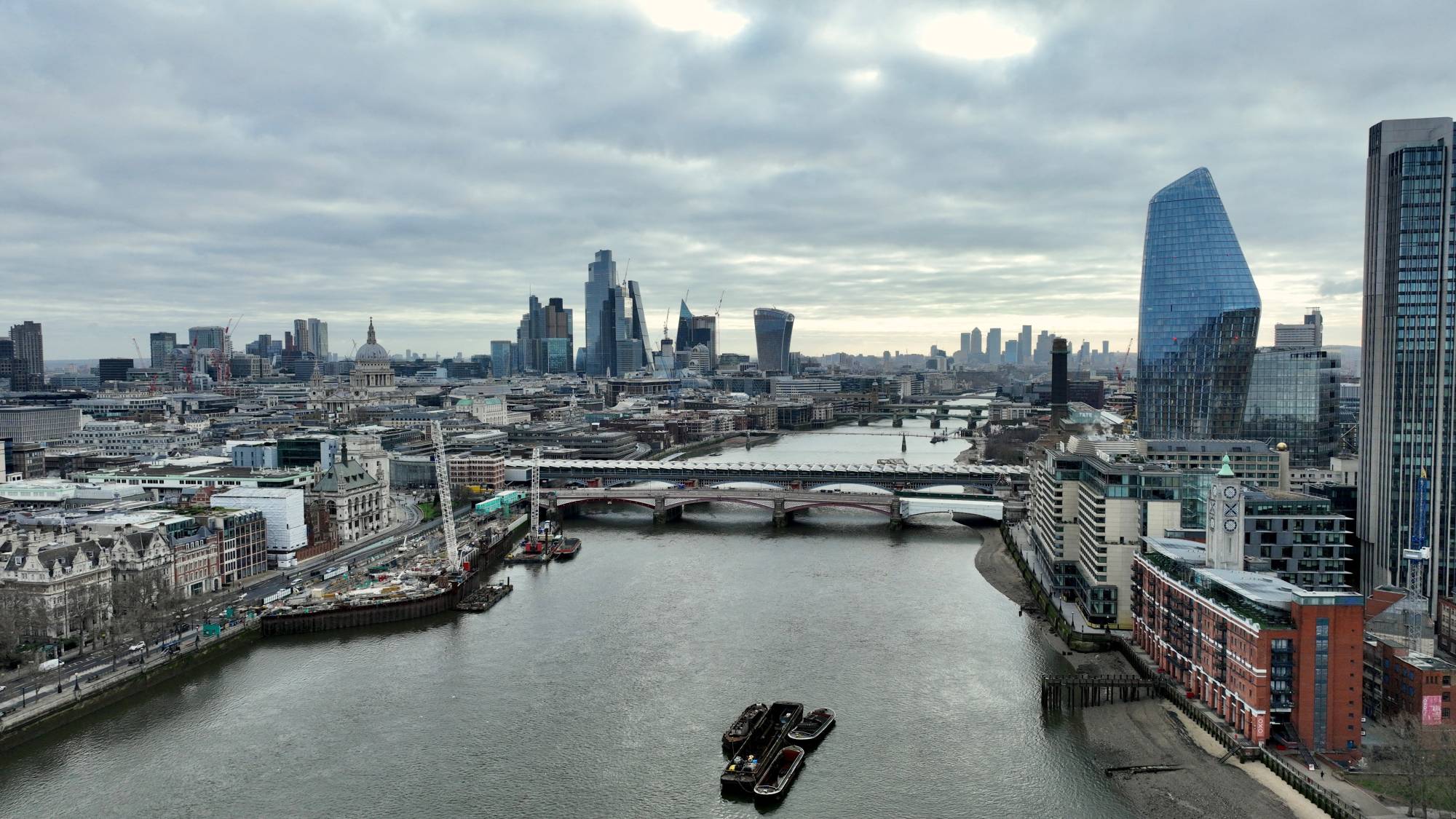 A view of the British capital's twin financial powerhouses, the City of London and Canary Wharf, on March 19 | REUTERS