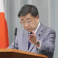 Chief Cabinet Secretary Hirokazu Matsuno said Japan has urged China to release a Japanese national held in Beijing. | KYODO