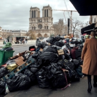 Uncollected bags of trash near Notre-Dame cathedral in central Paris in March | BLOOMBERG