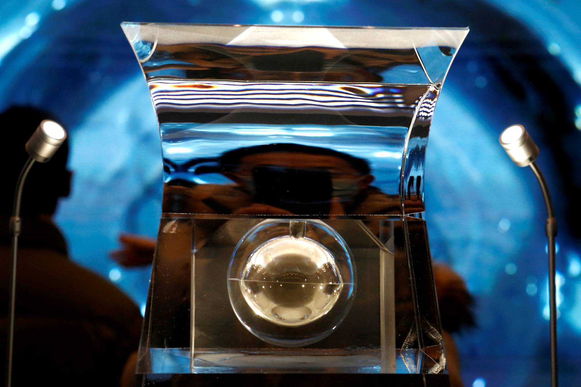 Moon samples from China’s lunar exploration program Chang'e-5 are displayed during an exhibition at the National Museum in Beijing in 2021. | REUTERS