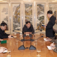 Kim meets with officials at an undisclosed location in the country, in this image released Tuesday.  | KCNA / KNS / VIA AFP-JIJI 