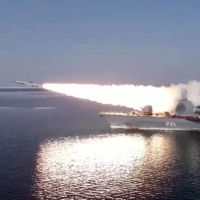 A missile boat of the Pacific Fleet firing a Moskit cruise missile at a mock enemy target in the Sea of Japan during military exercises on Tuesday.  | RUSSIAN DEFENCE MINISTRY / VIA AFP-JIJI