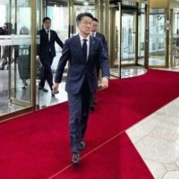 Naoki Kumagai, deputy chief of mission at the Japanese Embassy in South Korea, enters the South Korean Foreign Ministry in Seoul on Tuesday. | KYODO