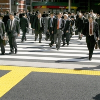Japanese workers on average make the lowest salaries among the Group of Seven nations. Still, it\'s harder to legally fire employees or cut their salaries.  | BLOOMBERG 