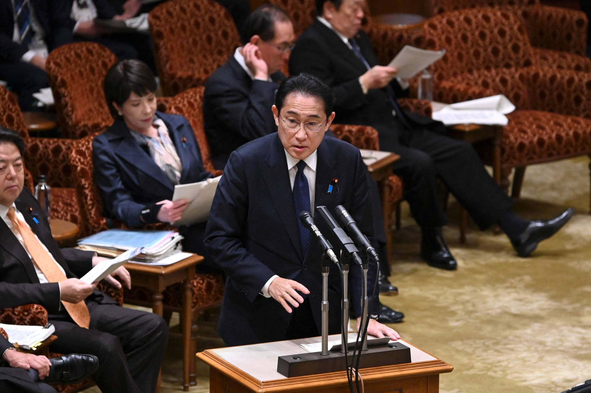 Prime Minister Fumio Kishida answers questions during a budget committee session of the Upper House at parliament in Tokyo on Monday. | AFP-JIJI