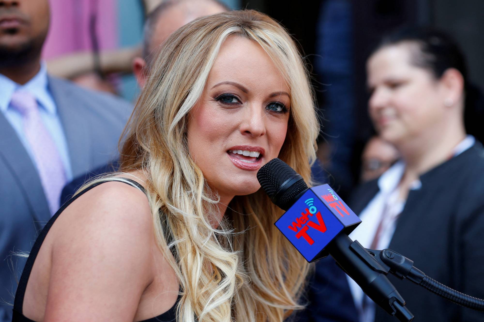 Stormy Daniels speaks during a ceremony in her honor in West Hollywood, California, in May 2018. | REUTERS