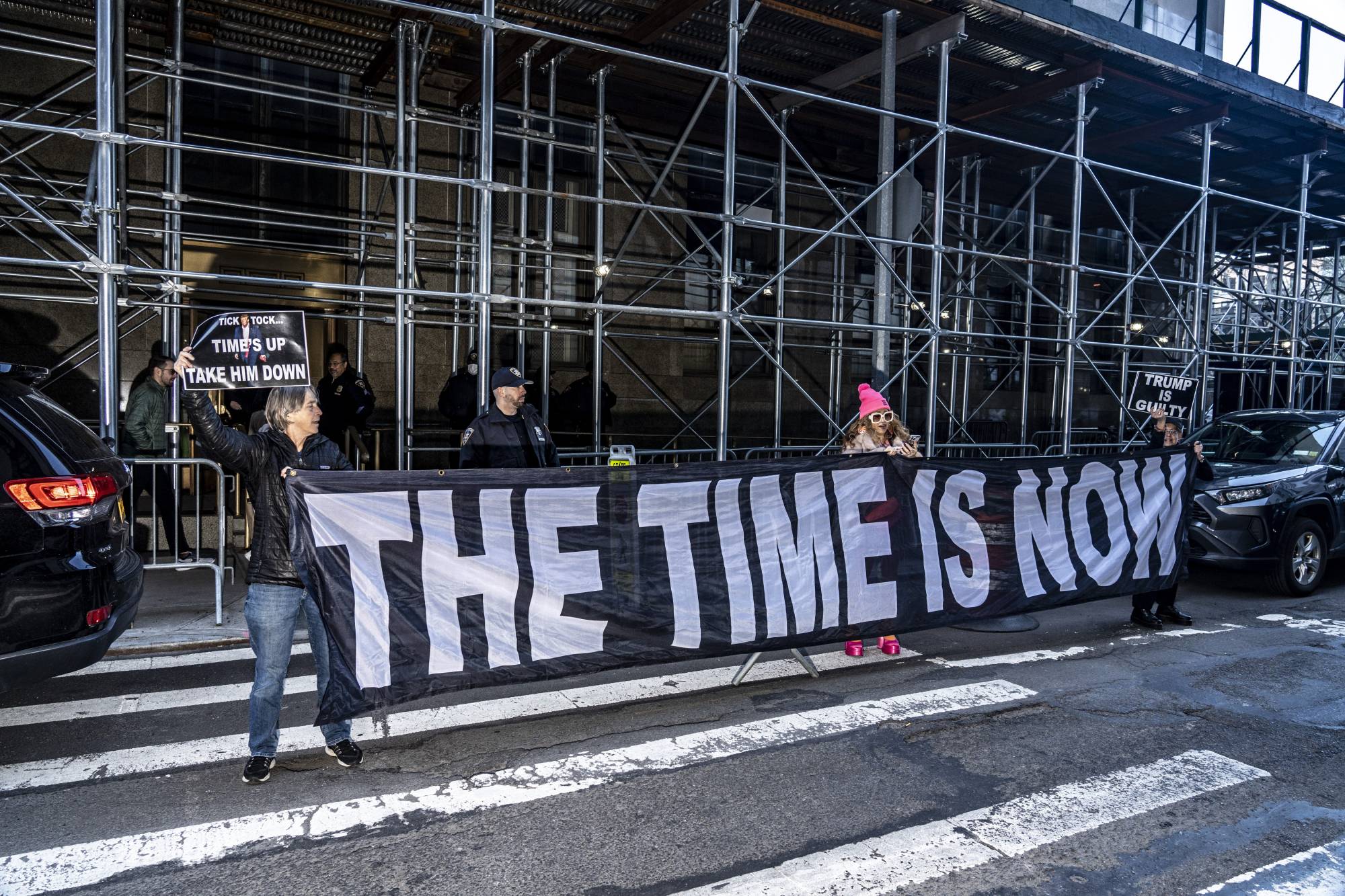 Demonstrators outside the Manhattan Criminal Courthouse after a grand jury indicted Trump on Thursday | Mark Peterson / The New York Times