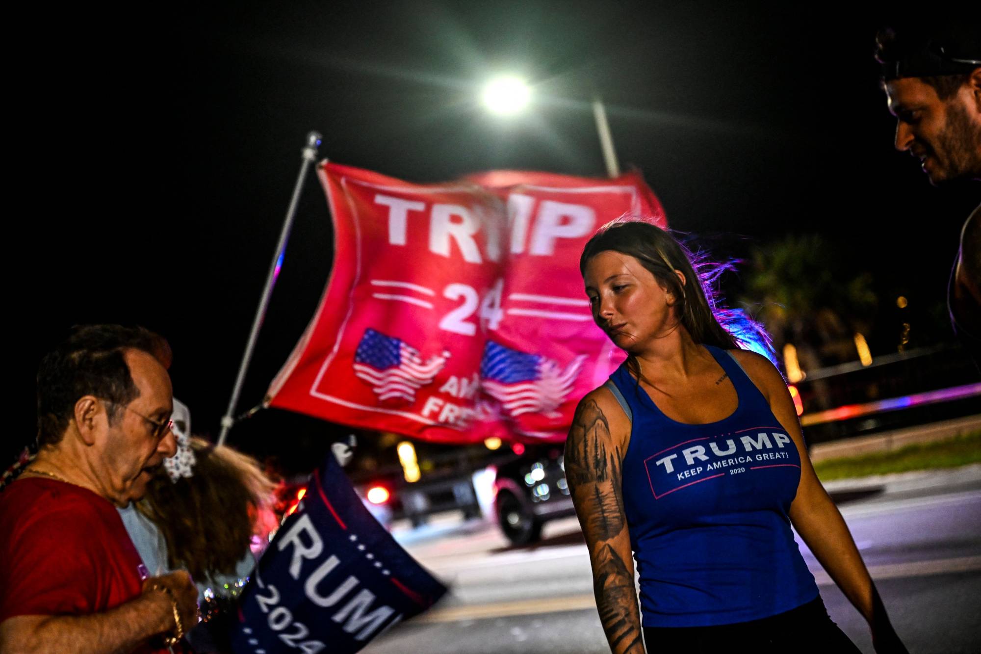 Supporters of Trump protest near the Mar-a-Lago Club in Palm Beach, Florida, on Thursday | AFP-JIJI