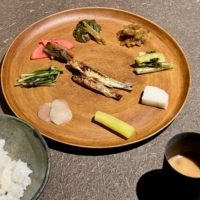 The final main dish at Shizen is rice slowly cooked over the wood fire, served with an array of his pickles and ferments. | ROBBIE SWINNERTON
