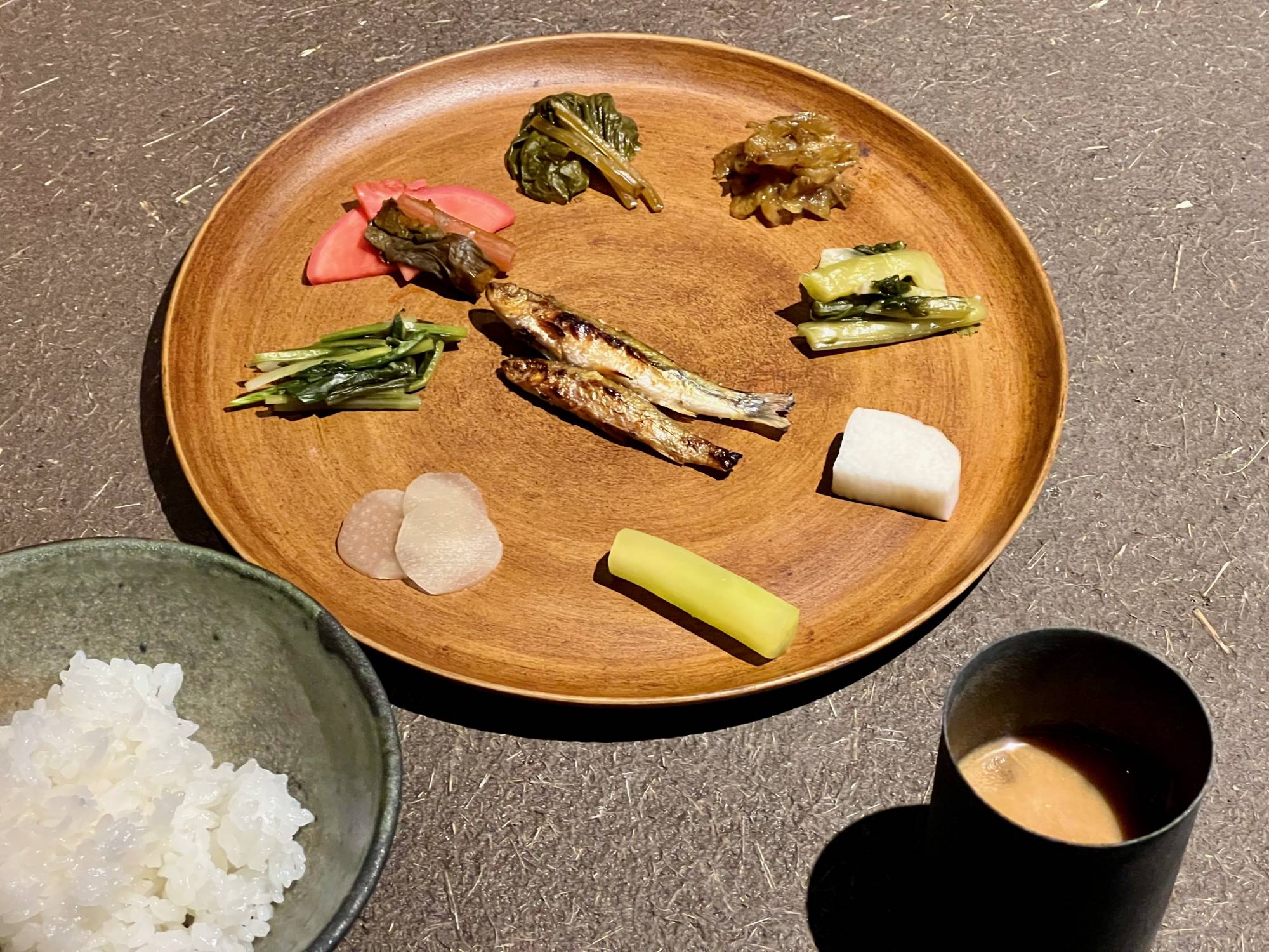 The final main dish at Shizen is rice slowly cooked over the wood fire, served with an array of his pickles and ferments. | ROBBIE SWINNERTON 