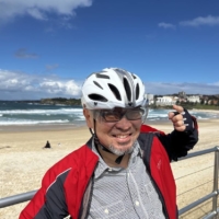 Satoshi Hikita is an author and cycling advocate. As a new revised Road Traffic Act goes into effect requiring people to “make efforts” to wear helmets while riding bikes, he thinks many won’t follow the rule. | COURTESY OF MIMI TAKAHASHI
