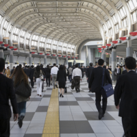 Commuters transfer at Shinagawa Station in Tokyo, one of the busiest stations in the world. | KYODO