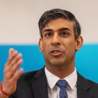British Prime Minister Rishi Sunak speaks during an event on March 27. | POOL / VIA REUTERS