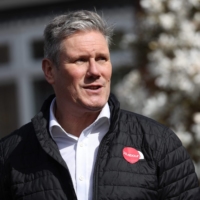 British Labour Party leader Keir Starmer speaks during an interview while canvassing voters for support in Swindon, England, on Thursday.  | AFP-JIJI