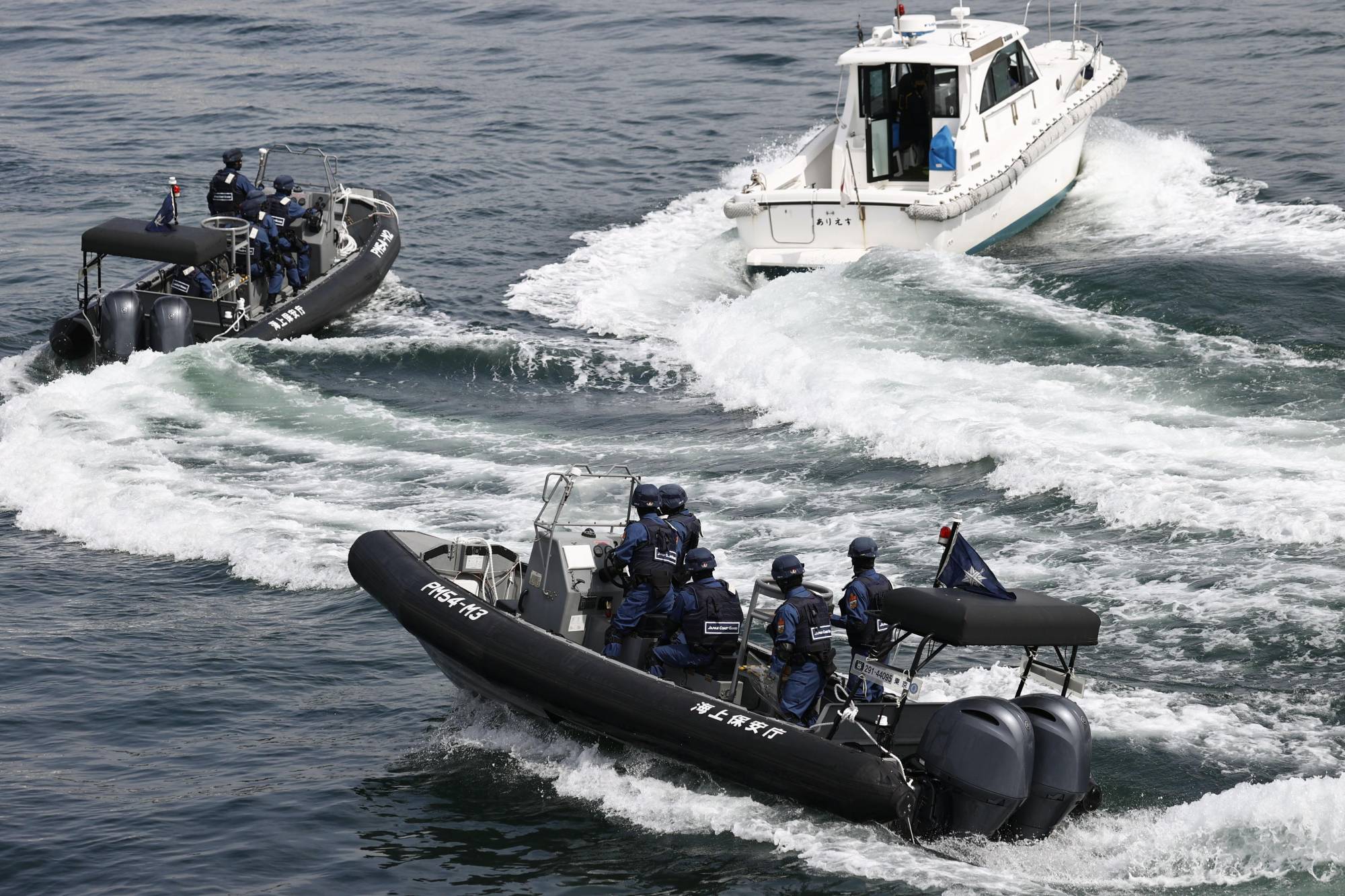 A maritime safety drill is held in March at Hiroshima Port in Hiroshima for a Group of Seven summit meeting scheduled in the city in May. | KYODO